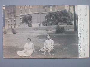 2 people sitting in front of the Meadville Theological School.